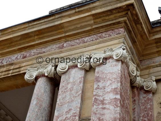 French ionic pilaster capitals.